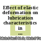 Effect of elastic deformation on lubrication characteristics in different clearances and head size of metallic artificial hip joint